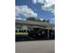 Assigned covered parking for residents, providing shade and convenience at 1903 Canterbury Ln # B2, Sun City Center, FL 33573