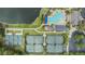 Overhead aerial view highlighting the community pool, tennis courts, and scenic walking paths at 19529 Lily Pond Ct, Brooksville, FL 34601