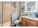 Modern bathroom featuring a tiled glass shower and sleek vanity at 19529 Lily Pond Ct, Brooksville, FL 34601
