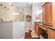 This bathroom features a glass shower enclosure, wood cabinets and granite countertop at 19529 Lily Pond Ct, Brooksville, FL 34601