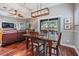 Cozy dining area adjacent to the living room, with backyard patio access at 19529 Lily Pond Ct, Brooksville, FL 34601