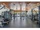 Spacious gym with various weight machines, treadmills, and fitness equipment for a complete workout at 19529 Lily Pond Ct, Brooksville, FL 34601