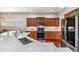 Well-equipped kitchen with modern appliances, hardwood floors, and stylish design at 19529 Lily Pond Ct, Brooksville, FL 34601