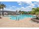 Inviting swimming pool featuring a tanning deck, an awning, and covered seating area at 19529 Lily Pond Ct, Brooksville, FL 34601