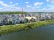 Aerial view of the home's location in the community near the lake at 28853 Seedling St, Wesley Chapel, FL 33543
