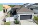 Charming one story home with a two car garage and screened in porch at 28853 Seedling St, Wesley Chapel, FL 33543