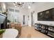 Bright and airy living room with modern light fixture and stylish decor at 28853 Seedling St, Wesley Chapel, FL 33543