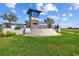 Inviting entrance to the Summerstone community with landscaped grounds, signage, and a welcoming architectural feature at 2933 Maiden Grass Isle, Wesley Chapel, FL 33543