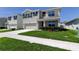 Charming two-story home with a two-car garage and well-maintained landscaping at 2933 Maiden Grass Isle, Wesley Chapel, FL 33543
