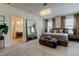 Beautiful main bedroom features a view of the outdoors and includes an ensuite bathroom at 2933 Maiden Grass Isle, Wesley Chapel, FL 33543