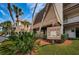 Community locator map with well-maintained landscaping, palm trees and partial building view at 3021 Countryside Blvd # 45A, Clearwater, FL 33761