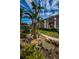 Attractive community pond framed by mature palm trees and vibrant landscaping, adding to the building's curb appeal at 3021 Countryside Blvd # 45A, Clearwater, FL 33761