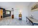 Living area showcasing marble-look tile floors and neutral decor at 3021 Countryside Blvd # 45A, Clearwater, FL 33761