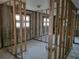 Framed-out room ready for renovation with block-wall and window at 3919 Harrisburg Ne St, St Petersburg, FL 33703