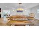 Dining room featuring a wooden table and decorative bench at 4106 W Cleveland St, Tampa, FL 33609