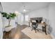 Home office with hardwood floors, ceiling fan, and a large window at 4106 W Cleveland St, Tampa, FL 33609