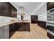 Modern kitchen boasts stainless appliances and open floor plan at 4106 W Cleveland St, Tampa, FL 33609