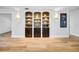Living room featuring built-in shelving and modern decor at 4106 W Cleveland St, Tampa, FL 33609