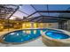 An enticing pool and spa are easily accessed from multiple points within the home at 4106 W Cleveland St, Tampa, FL 33609