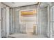 Interior shot reveals a room's transformation with exposed walls and doorway at 4210 Headsail Dr, New Port Richey, FL 34652