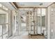 Interior view shows the property's framing and layout during the renovation process at 4210 Headsail Dr, New Port Richey, FL 34652