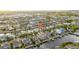Waterfront community featuring beautiful single Gathering homes with boat docks and canals in an aerial view at 422 Islebay Dr, Apollo Beach, FL 33572