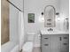 Bathroom featuring a shower-tub combo, toilet, and a vanity at 422 Islebay Dr, Apollo Beach, FL 33572