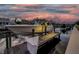White boat docked on a canal with neighboring waterfront homes at sunset at 422 Islebay Dr, Apollo Beach, FL 33572