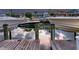 Canal view between docks, showcasing boats and waterfront homes in the neighborhood at sunset at 422 Islebay Dr, Apollo Beach, FL 33572
