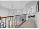 Hallway with a view of a bedroom and an ornate chandelier at 422 Islebay Dr, Apollo Beach, FL 33572