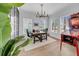 Bright and airy home office with hardwood floors, a game machine, and ample natural light at 422 Islebay Dr, Apollo Beach, FL 33572