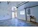 Open garage space with a well-lit interior offers plenty of room for vehicles and storage, with convenient side entry at 510 55Th Ne Ave, St Petersburg, FL 33703