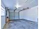 Spacious garage with gray door, concrete flooring, and ample room for parking and storage at 510 55Th Ne Ave, St Petersburg, FL 33703