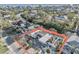 Aerial view of the home with a pool and waterfront access, all within a vibrant neighborhood at 5430 Avenida Del Mare, Sarasota, FL 34242