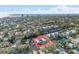 Aerial view of the waterfront property with a glimpse of the beach and the city at 5430 Avenida Del Mare, Sarasota, FL 34242