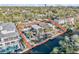 Aerial view of the house highlighting the pool and canal front location at 5430 Avenida Del Mare, Sarasota, FL 34242