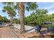 Relaxing backyard area with a seating area and picturesque waterfront views, perfect for outdoor enjoyment at 5430 Avenida Del Mare, Sarasota, FL 34242