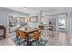 Inviting dining room featuring a classic table setting and bright natural light at 5430 Avenida Del Mare, Sarasota, FL 34242