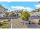 Charming home featuring palm trees, a two-car garage, and beautifully arranged landscaping at 5430 Avenida Del Mare, Sarasota, FL 34242