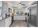 Well-equipped kitchen with stainless steel appliances, granite countertops, and ample storage space at 5430 Avenida Del Mare, Sarasota, FL 34242