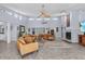 Bright and airy living room featuring high ceilings, tile floors, and an open layout, perfect for relaxation and entertaining at 5430 Avenida Del Mare, Sarasota, FL 34242
