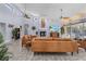 Open living room with stylish furnishings, fireplace, and a seamless transition to the outdoors at 5430 Avenida Del Mare, Sarasota, FL 34242