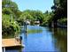 Beautiful waterway access with dock, perfect for boating and enjoying the tranquil surroundings at 5430 Avenida Del Mare, Sarasota, FL 34242