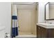 Clean bathroom with a shower, vanity, and toilet, perfect for a refreshing start to the day at 5619 New York Ave, Sarasota, FL 34231