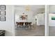 Open floor plan featuring a dining area with modern decor and ample natural light at 5619 New York Ave, Sarasota, FL 34231