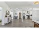 Bright, open-concept space featuring modern kitchen and dining area perfect for entertaining at 5619 New York Ave, Sarasota, FL 34231