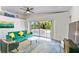 Bright living space with access to outdoor patio, perfect for entertaining and relaxation at 5619 New York Ave, Sarasota, FL 34231