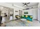 Inviting living space with contemporary furnishings and open access to the modern kitchen at 5619 New York Ave, Sarasota, FL 34231
