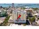 An aerial view showcasing the condominium building against the backdrop of the city at 628 Cleveland St # 612, Clearwater, FL 33755