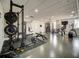 Fully equipped gym with weights, machines, and mirrored wall, offering a comprehensive fitness experience at 628 Cleveland St # 612, Clearwater, FL 33755